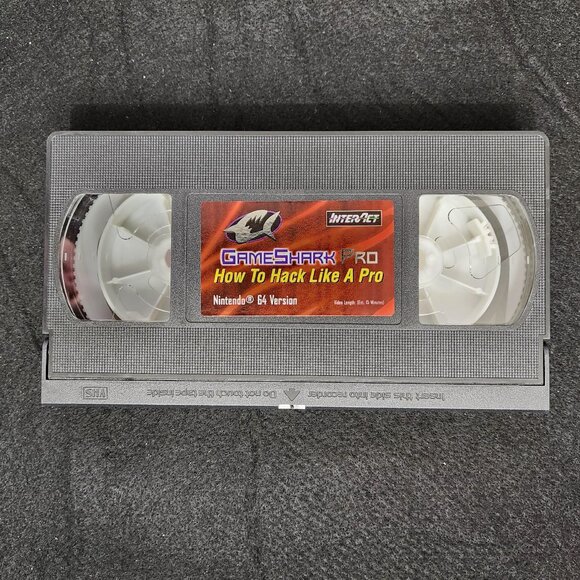 N64 Game Shark Pro  V 3.3 With original box and VHS Tape - Picture 6 of 13